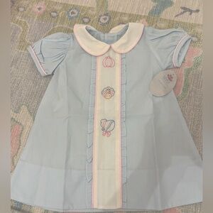 Baby Sen embroidered turkey and pumpkin dress.